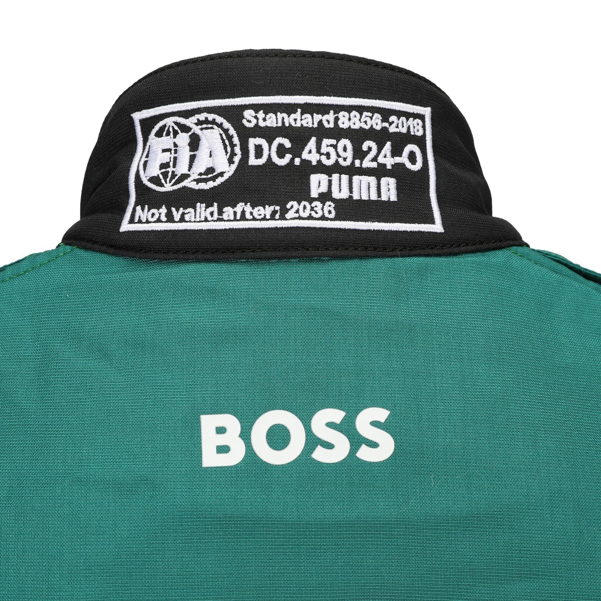  FIA and Puma collar label on Fernando Alonso’s 2026 Aston Martin F1 race suit – Trending Racegear.