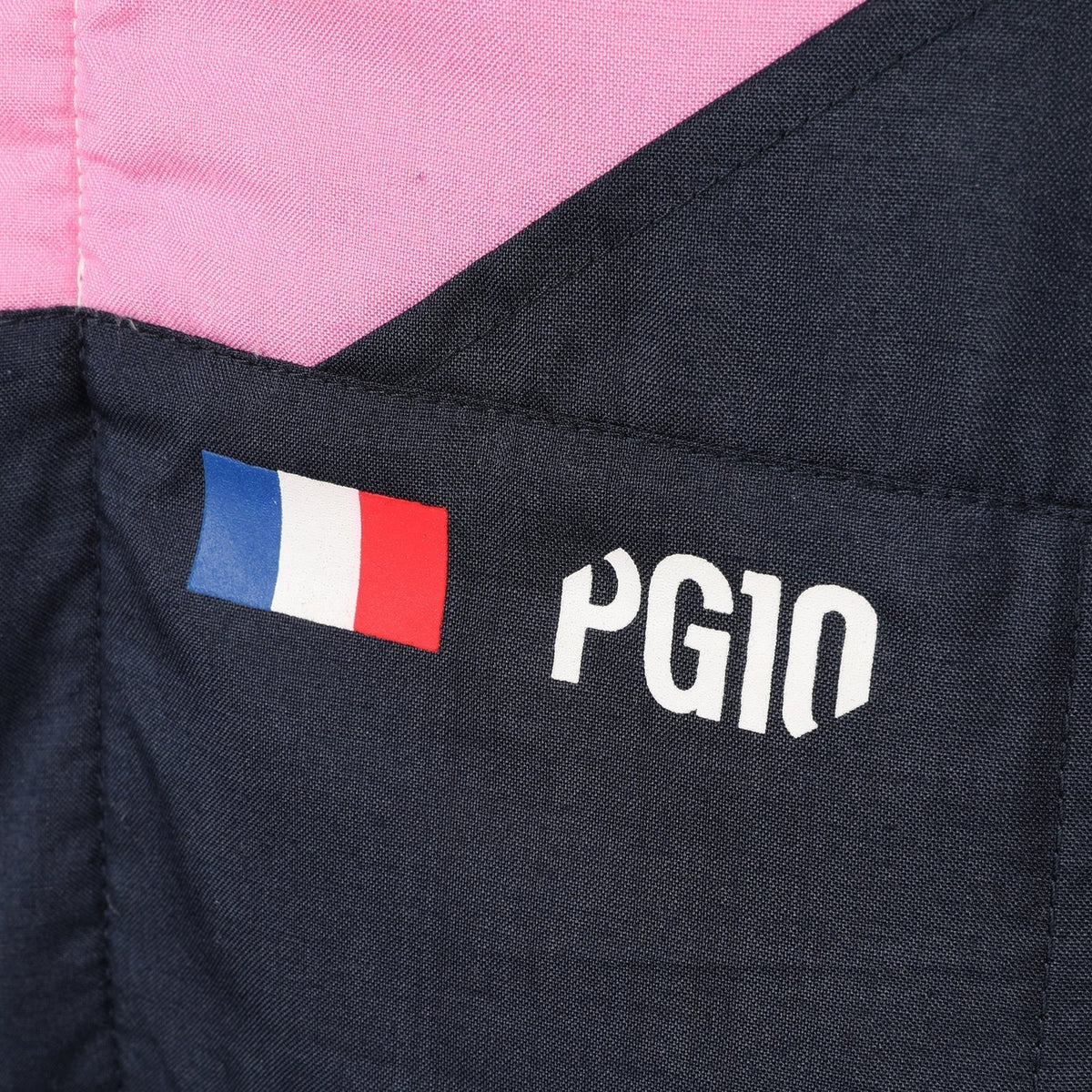 Pierre Gasly PG10 and French flag detail on the 2026 Alpine F1 race suit – Trending Racegear.